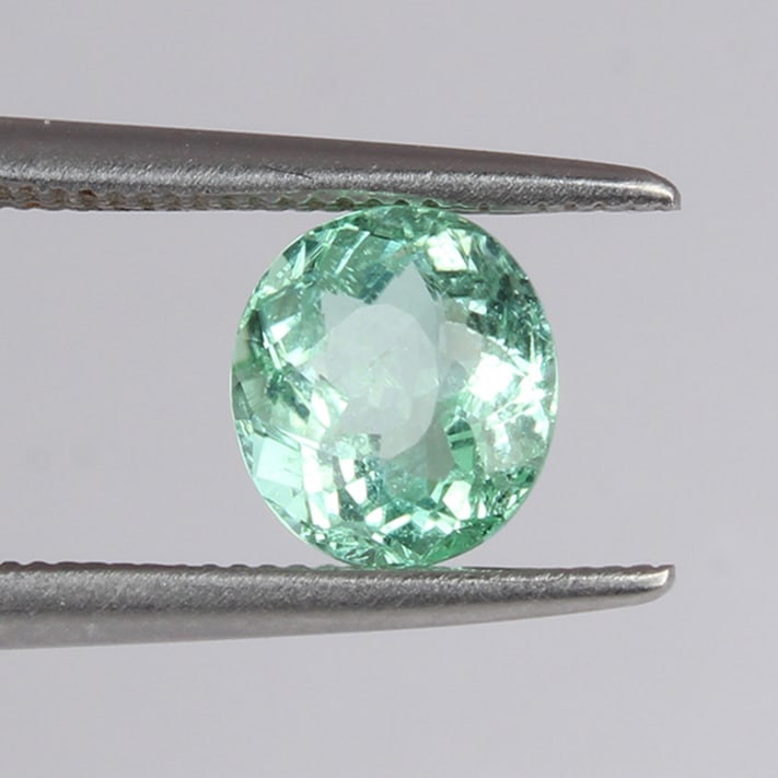 IGI Cert. 1.17 ct. Neon Yellow Green " PARAIBA" BRAZIL: IGI Certified 1.17 ct. Neon Yellowish Green Paraiba Tourmaline - BRAZIL Cut - Oval Fancy cut Color - Neon Yellowish Green Clarity - VS Ct. Weight - 1.17 ct. Dimensions - 6.76 x 6.12 x 4.20 mm<