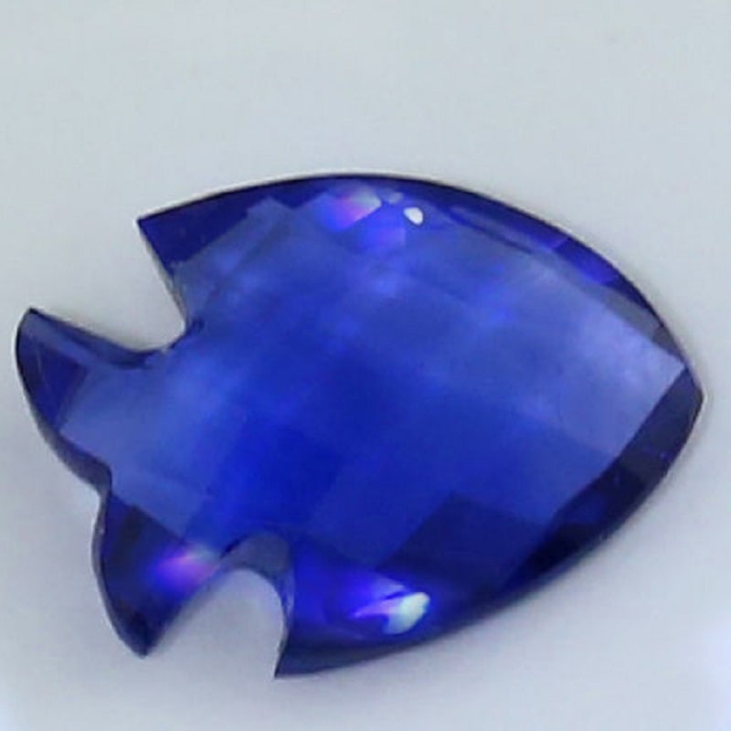 IGI Certified 1.34 ct. Blue Sapphire - SRI LANKA: IGI Certified 1.34 ct. Blue Sapphire - SRI LANKA Ct. Weight - 1.34 ct. Cut - Fish Mixed Cut Color - Blue Clarity - VS Dimensions - 9.07 X 6.68 X 2.66 mm Origin - SRI LANK