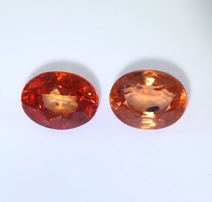 IGI 0.62 ct. Set of 2 Padparadscha Sapphires MADAGASCAR: IGI Certified 0.62 ct. Set of 2 Padparadscha Sapphires - MADAGASCAR Color - Pinkish Orange and Pink Orange Clarity - SI Cut - Oval Mixed Cut Weight - 0.28 + 0.34 = 0.62 ct. Dimensions - 4.09 x