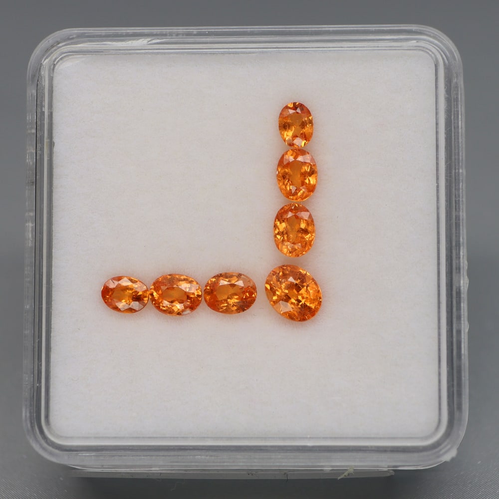 HGL Certified 2.42 ct. Spessartite Garnet Lot - NAMIBIA: HGL Certified 2.42 ct. Spessartite Garnet Lot - NAMIBIA Color - Fanta orange Cut - Oval Ct. Weight - 2.42 ct. Dimensions - 4x3 to 5x4mm Treatment - None