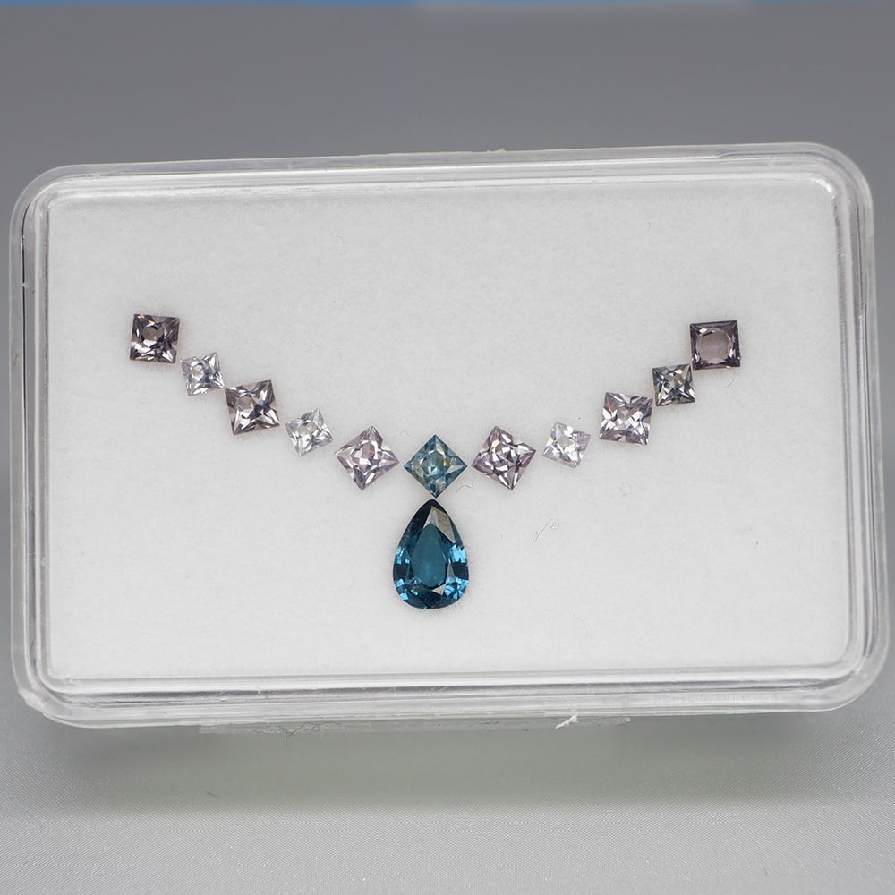 HGL Certified 2.22 ct. Spinel Lot - BURMA: HGL Certified 2.22 ct. Spinel Lot Color - Fancy Color Cut - Pear & Square Ct. Weight - 2.22ct. Dimensions - 2.5x2.5 to 7x5mm Treatment - None Clarity - VS No. of spinel - 12