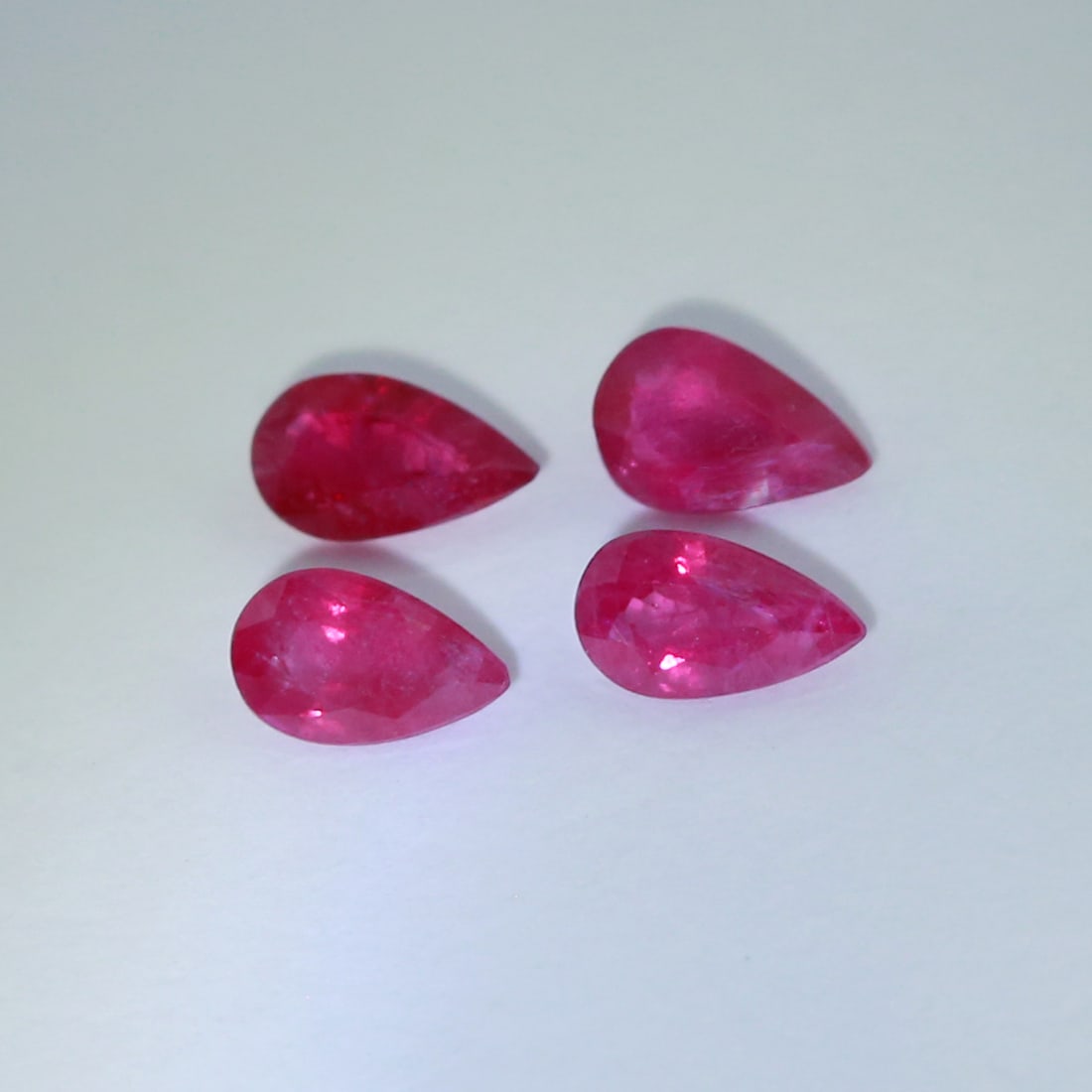 IGI Certified Set of 4 Rubies 0.97 ct. - BURMA: IGI Certified Set of 4 Rubies 0.97 ct. - BURMA Cut - Pear Mixed Cut Color - Purplish Red Clarity - SI Ct. Weight - 0.25 + 0.26 + 0.21 + 0.25 = 0.97 ct. Dimensions - 4.93 x 3.09 x 2.08 mm ; 5.0