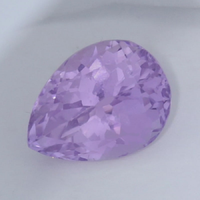 IGI Cert.11.05 ct. Kunzite - Purple Pink AFGHANISTAN: IGI Certified 11.05 ct. Kunzite - Purple Pink AFGHANISTAN Excellent Color and clarity Color - Purple Pink Cut - Pear Mixed cut Ct. Wt. - 11.05 ct. Clarity - VVS Dimensions - 15.3