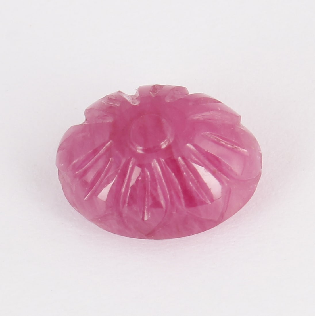 GFCO (SWISS) Certified 5.91 ct. Carved Ruby - AFRICA: GFCO (SWISS) Certified 5.91 ct. Carved Ruby - AFRICA Cut - Oval Carving Color - Red - Pink / Pink - Red Clarity - Semi-Transparent Ct. Weight - 5.91 ct. Dimensions - 11.35 x 8.89 x 6.18 mm <