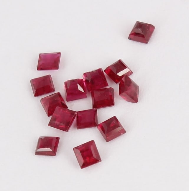 GFCO Cert. 1.16 ct. Set of 14 Rubies - MOZAMBIQUE: GFCO (SWISS) Certified Set of 14 - 1.16 ct. Rubies - MOZAMBIQUE Ct. Weight - 1.16 ct. Color - Red Cut - Square Step cut Clarity - VS-SI Dimensions - 2.19 x 2.18 x 1.4