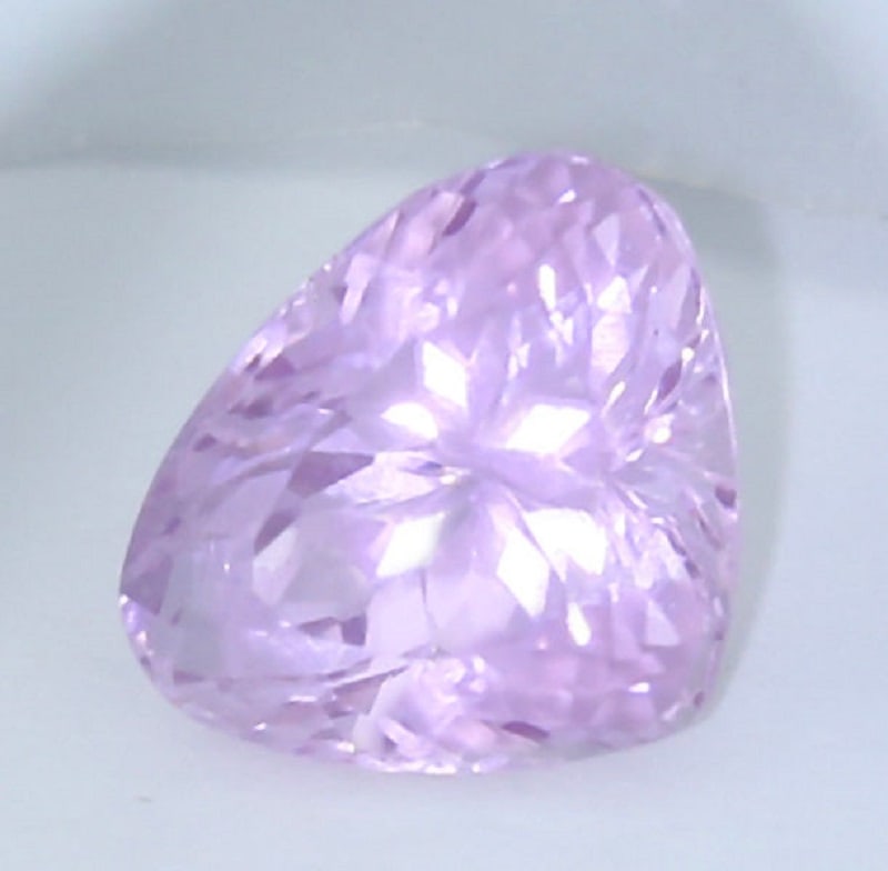 IGI Cert. 11.23 ct. Kunzite Purplish Pink AFGHANISTAN: IGI Certified 11.23 ct. Kunzite - Purplish Pink - AFGHANISTAN Excellent Color and clarity Cut - Pear Mixed cut Color - Purplish Pink Ct. Weight - 11.23 ct. Clarity - VVS Dimensio
