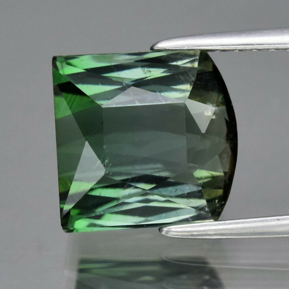 3.42 ct. Natural Unheated Green Tourmaline - MOZAMBIQUE: 3.42 ct. Natural Unheated Green Tourmaline - MOZAMBIQUE Shape - Fancy Color - Green Clarity - SI1 Ct. Weight - 3.42 ct. Dimensions - 8.50 x 8.50 x 5.30 mm Origin - MOZAMB