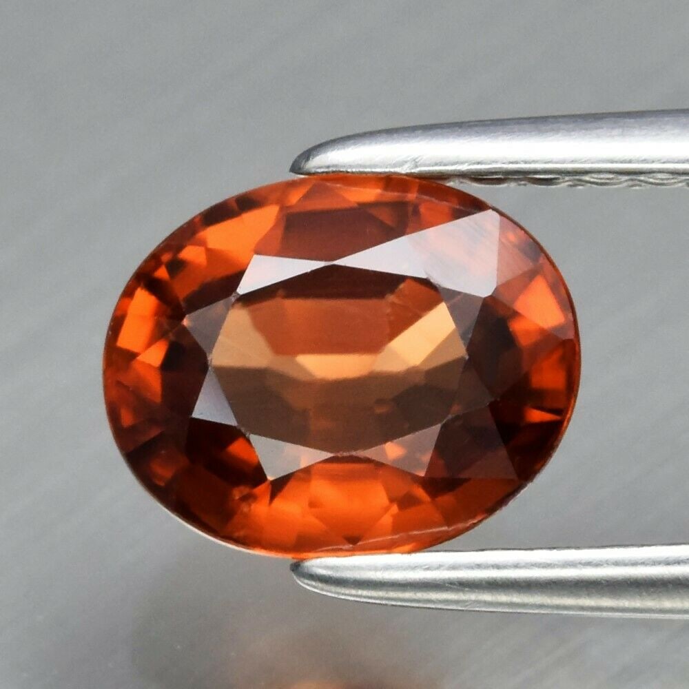 1.58 ct. Natural Orange Zircon - TANZANIA: 1.58 ct. Natural Orange Zircon - TANZANIA Shape - Oval Color - Orange Clarity - VVS Ct. Weight - 1.58 ct. Dimensions - 7.00 x 5.70 x 3.60 mm Origin - TANZANIA