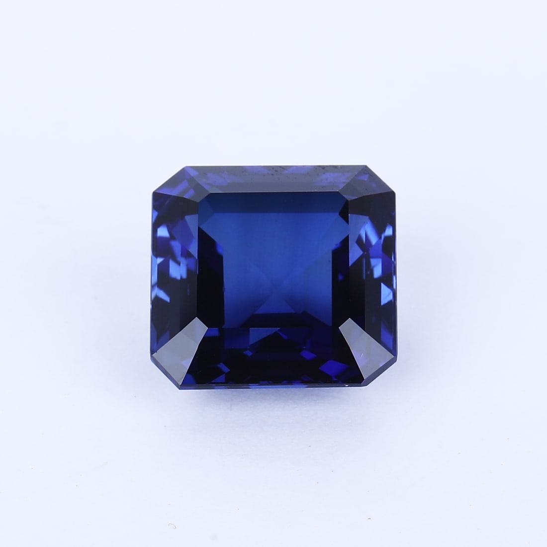 17.88 ct. Royal Blue Sapphire - SRI LANKA: 17.88 ct. Royal Blue Sapphire - SRI LANKA Color - Royal Blue Cut - Cut-cornered Cushion Ct. Wt. -17.88 ct. Clarity - VVS Origin - SRI LANKA Treatment - H