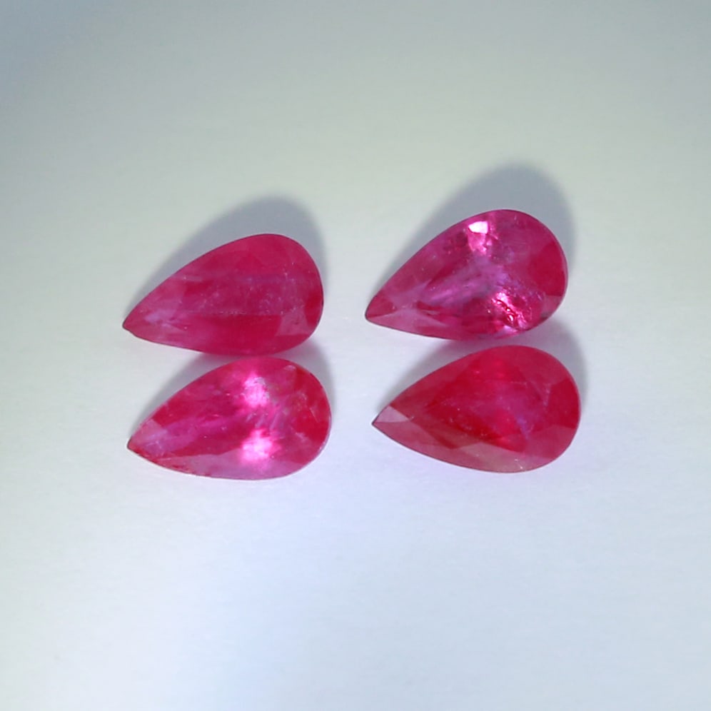 IGI Certified Set of 4 Rubies 1.05 ct. - BURMA: IGI Certified Set of 4 Rubies 1.05 ct. - BURMA Cut - Pear Mixed Cut Color - Purplish Red Clarity - SI Ct. Weight - 0.22 + 0.32 + 0.23 + 0.28 = 1.05 ct. Dimensions - 5.04 x 2.95 x 1.88 mm ; 5.1