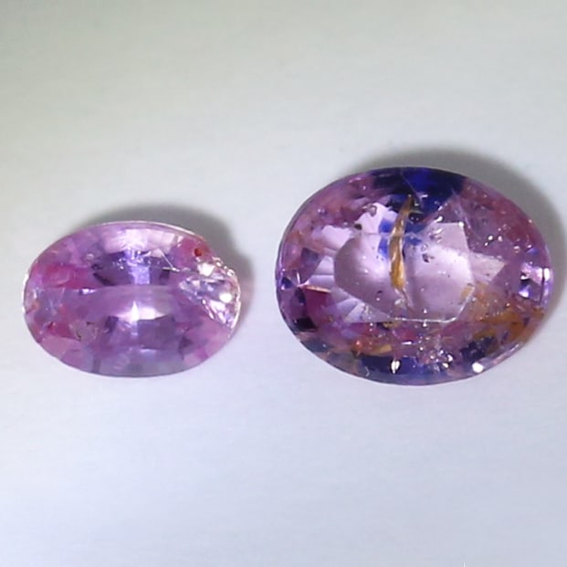 IGI Certified 0.60 ct. Set of 2 Rubies - BURMA: IGI Certified 0.60 ct. Set of 2 Rubies - BURMA Cut - Oval Mixed cut Color - Purple Red Clarity - SI Ct. Weight - 0.43 + 0.17 = 0.60 ct. Dimensions - 4.95 x 3.89 x 2.47 mm and 3.95 x 2.90 x 1.8