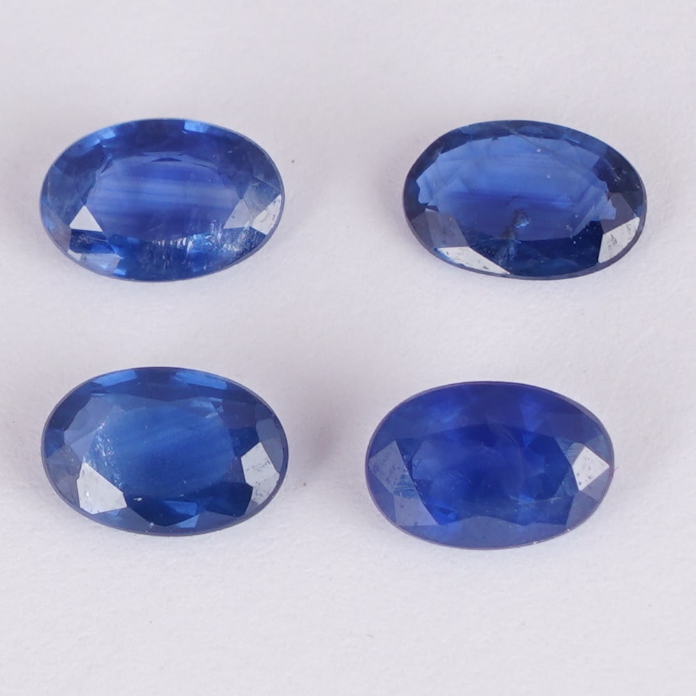 IGI Certified 1.90 ct. Set of 4 Blue Sapphires - MADAGASCAR: IGI Certified 1.90 ct. Set of 4 Blue Sapphires - MADAGASCAR Color - Blue Cut - Oval Mixed cut Clarity - SI Ct. Weight - 0.50 + 0.45 + 0.59 + 0.36 = 1.90 ct. Dimensions - 5.83 x 3.98 x 2.26 mm