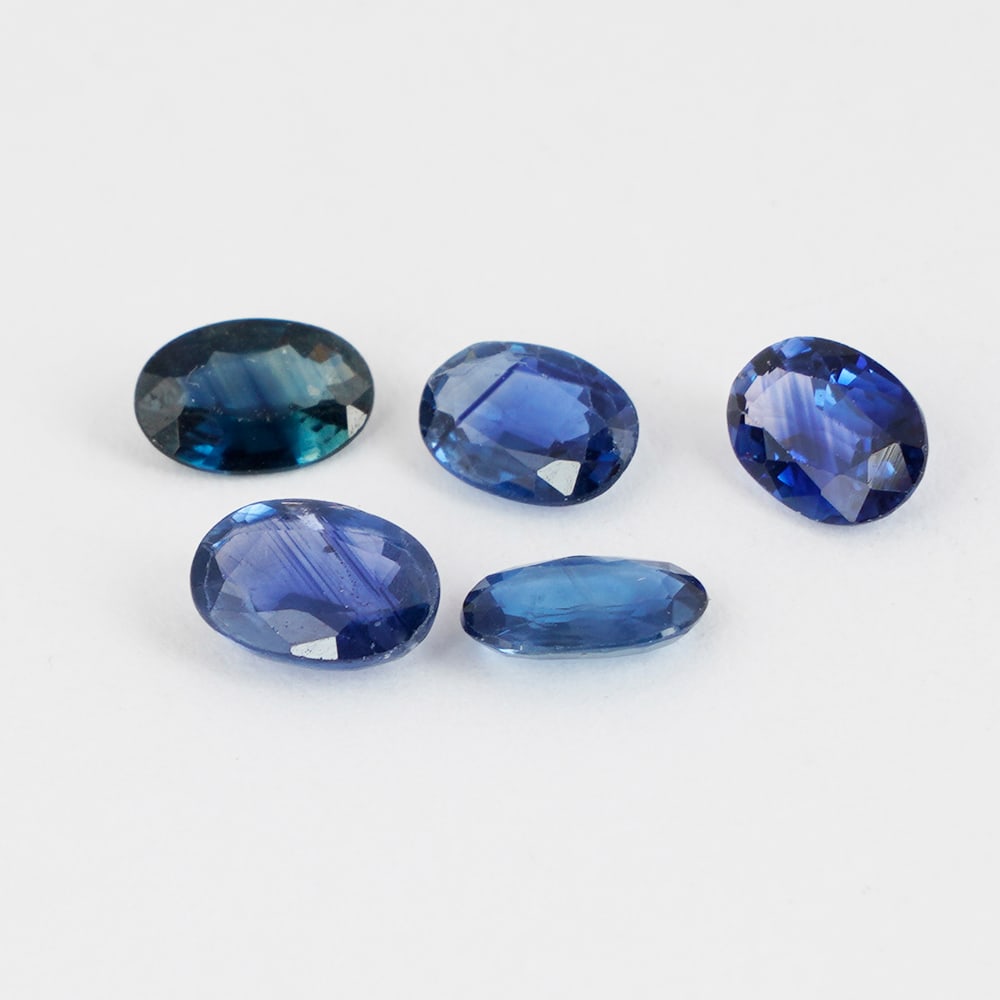 2.29 ct. Set of 5 Blue Sapphires - SRI LANKA, CEYLON: 2.29 ct. Set of 5 Blue Sapphires - SRI LANKA, CEYLON Color - Blue Cut - Oval Brilliant Cut Ct. Wt. - 2.29 ct. Clarity - SI No. of Sapphires - 5 Origin - SRI LANKA, CEYLON