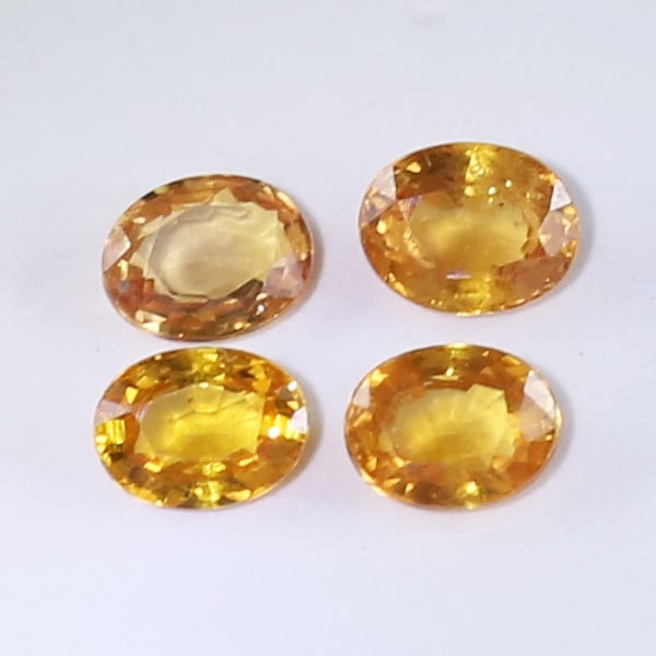 IGI Cert. Set of 4 Sapphires 0.80 ct. - MADAGASCAR: IGI Cert. Set of 4 Sapphires 0.80 ct. - MADAGASCAR Color - Yellowish Orange Cut - Oval Mixed cut Clarity - SI Ct. Weight - 0.18 + 0.20 + 0.24 + 0.18 = 0.80 ct. Dimensions - 3.89 x 3.10 x 1.54