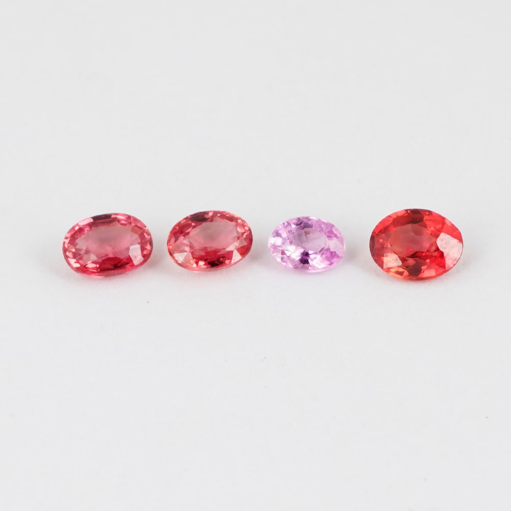 0.93 ct. Set of 4 Orange & Pink Sapphires - SRI LANKA, CEYLON: 0.93 ct. Set of 4 Orange & Pink Sapphires - SRI LANKA, CEYLON Color - Orange & Pink Cut - Oval Brilliant Cut Ct. Wt. - 0.93 ct. Clarity - VS No. of Sapphires - 4 Origin -