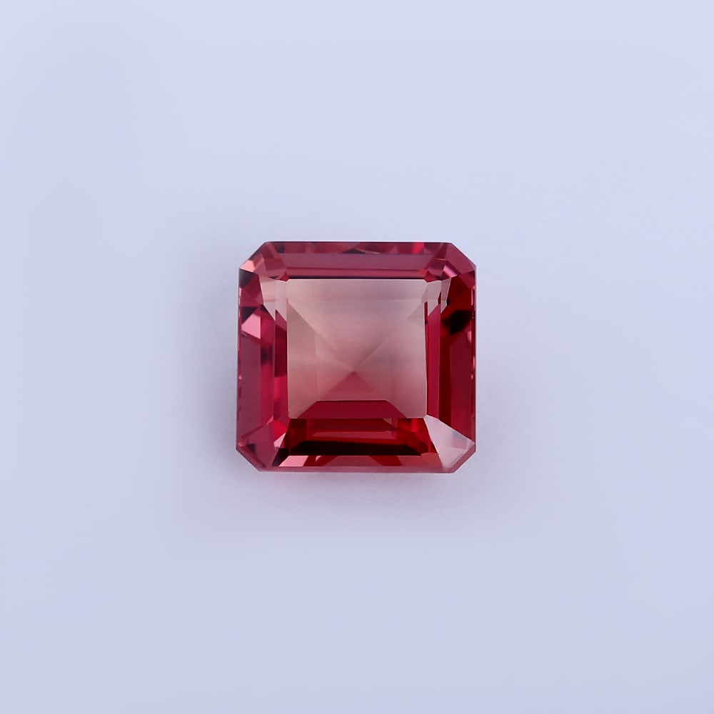 11.68 ct. Padparadscha Sapphire - SRI LANKA: 11.68 ct. Padparadscha Sapphire - SRI LANKA Color-Orange Pink Cut - Cut-cornered Cushion cut Ct. Wt.-11.68 ct. Clarity- VVS Origin - SRI LANKA Treatment