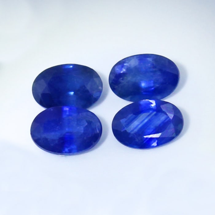 IGI Certified Set of 4 Blue Sapphires - Madagascar: IGI Certified Set of 4 Blue Sapphires - Madagascar Color - Blue Cut - Oval Mixed cut Clarity - VS-SI Ct. Weight - 0.69 + 0.59 + 0.65 + 0.48 = 2.41 ct. Dimensions - 6.08 x 4.18 x 3.07 mm ; 6.13