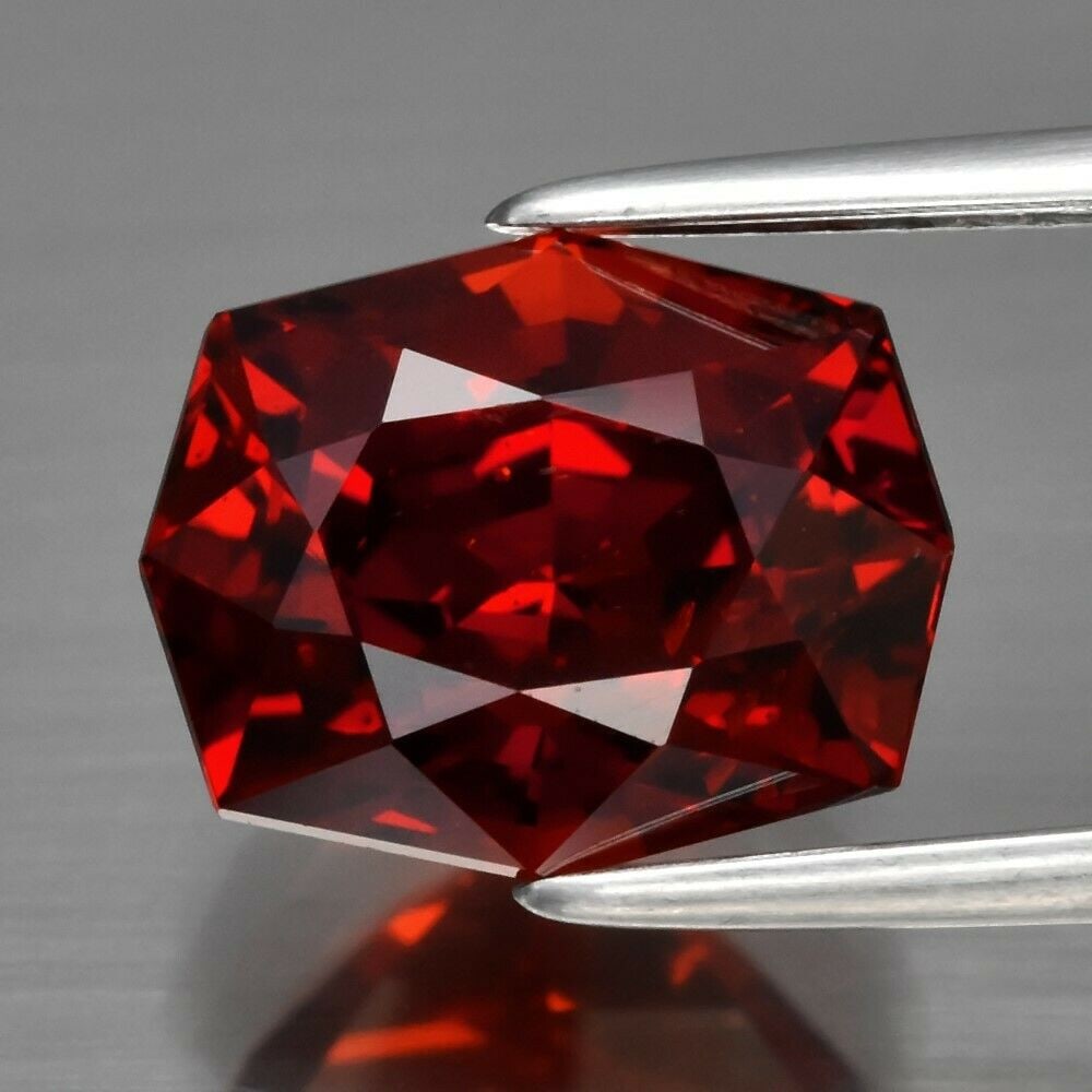 4.58 ct. Natural Unheated Spessartite Garnet - NAMIBIA: 4.58 ct. Natural Unheated Spessartite Garnet - NAMIBIA Cut - Fancy Color - Orange Ct. Weight - 4.58 ct. Clarity - SI1 Dimensions - 9.60 x 7.80 x 6.70 mm Origin - NAMIBIA,