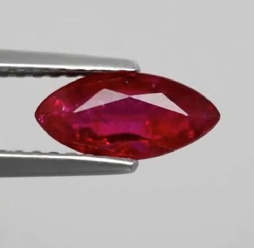 IGI Certified 1.03 ct. Purplish Red Ruby: IGI Certified 1.03 ct. Purplish Red Ruby Color - Purplish Red Cut - Marquise Mixed cut Clarity - VS Ct. Weight - 1.03 ct. Dimensions - 9.40 x 4.48 x 2.78 mm Origin - Afri