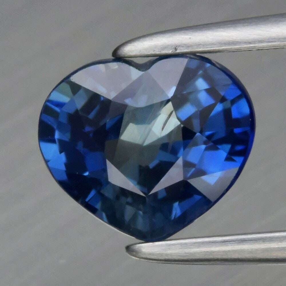 1.02 ct. Natural Unheated Green Blue Sapphire - AUSTRALIA: 1.02 ct. Natural Unheated Green Blue Sapphire - AUSTRALIA Shape - Heart Color - Green Blue Clarity - SI1 Ct. Weight - 1.02 ct. Dimensions - 6.30 x 5.40 x 3.80 mm Origin -