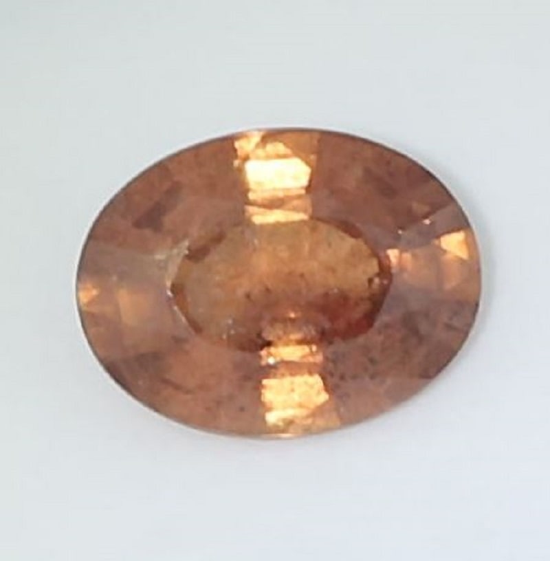 IGI Certified 1.29 ct. Brown Orange Sapphire - MADAGASCAR: IGI Certified 1.29 ct. Brown Orange Sapphire - MADAGASCAR Ct. Weight - 1.29 ct. Color - Brown Orange Cut - Oval Mixed cut Clarity - SI Dimensions - 7.65 x 5.86 x 3.53 mm Origin -