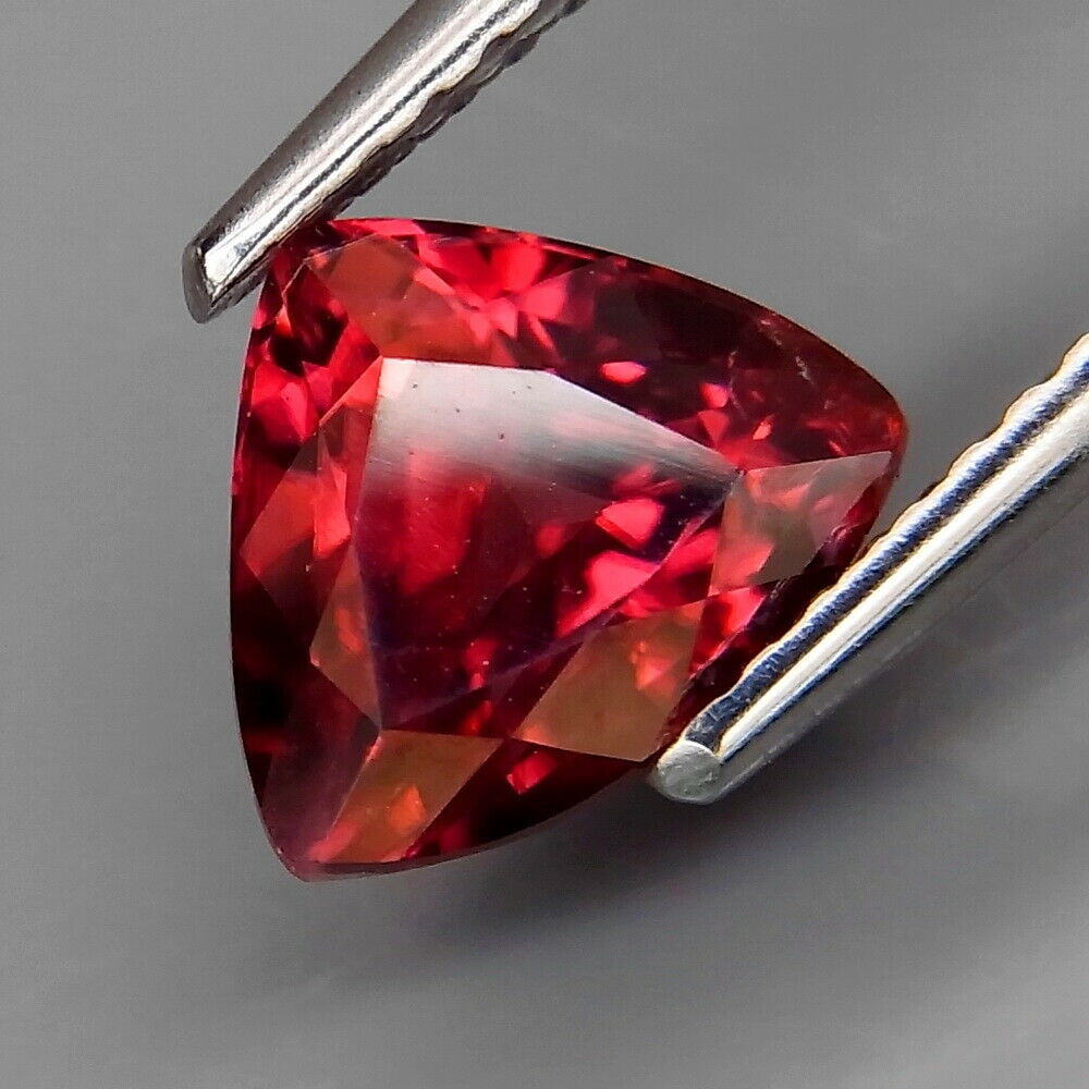 2.24 ct. Pink Zircon - TANZANIA: 2.24 ct. Pink Zircon - TANZANIA Color - Pink Clarity - VS Cut - Fancy Ct. Weight - 2.24 ct. Dimensions - 8.20 x 6.90 x 4.70 mm Origin - TANZANIA Treatment - None