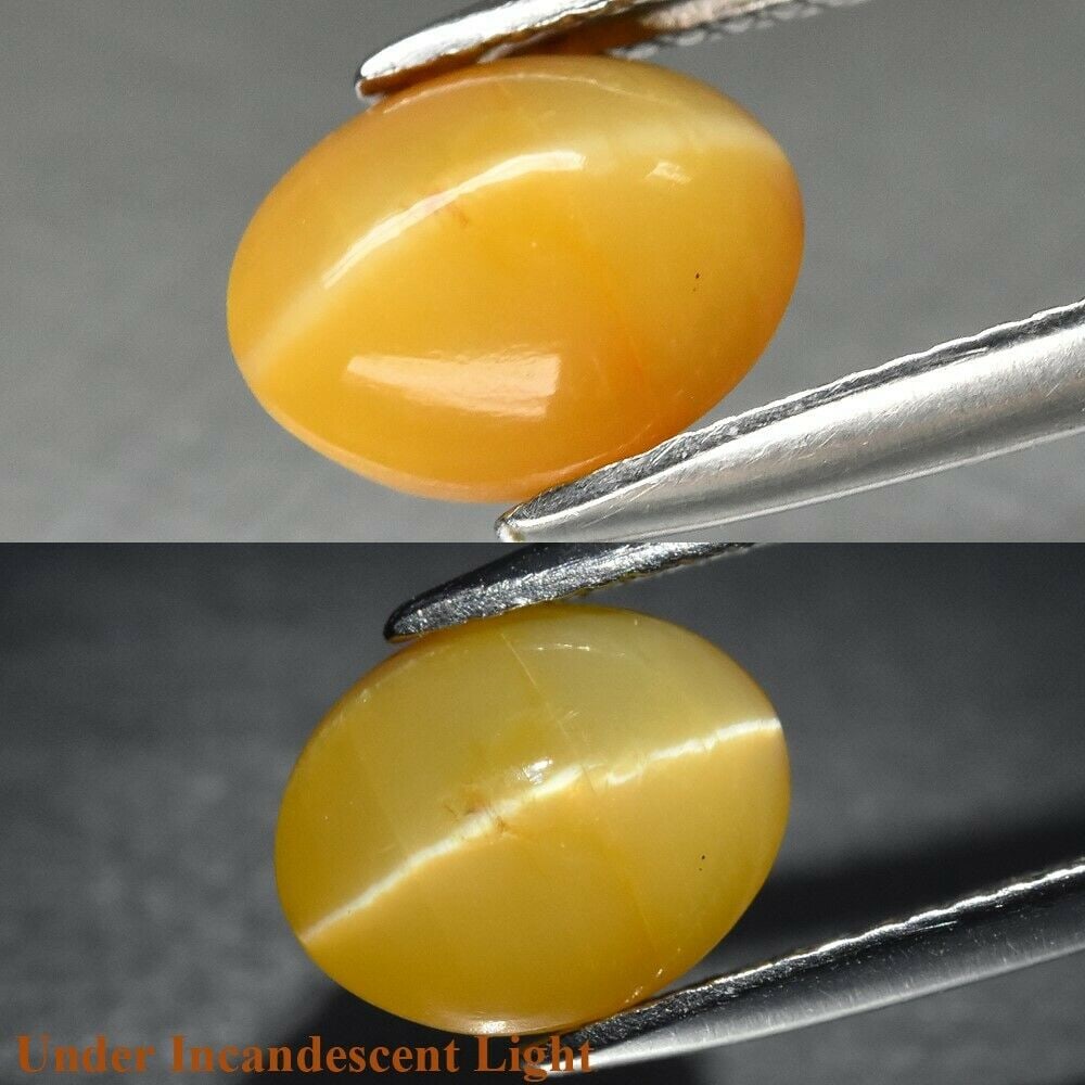 2.37 ct. Natural Cat’s Eye Opal - AFRICA: 2.37 ct. Natural Cat’s Eye Opal - AFRICA Shape - Oval Cabochon Color - Yellow Clarity - Opaque Ct. Weight - 2.37 ct. Dimensions - 9.80 x 7.80 x 5.50 mm Origin - AFRICA