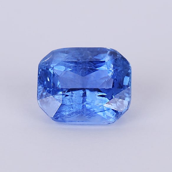 IGI Certified 5.55 ct. Blue Sapphire - SRI LANKA: IGI Certified 5.55 ct. Blue Sapphire Color - Blue Cut - Cut-Cornered Rectangular Mixed cut Ct. Wt. - 5.55 ct. Dimensions - 10.19 x 8.63 x 6.37 mm Treatment - Natural inclusions pattern