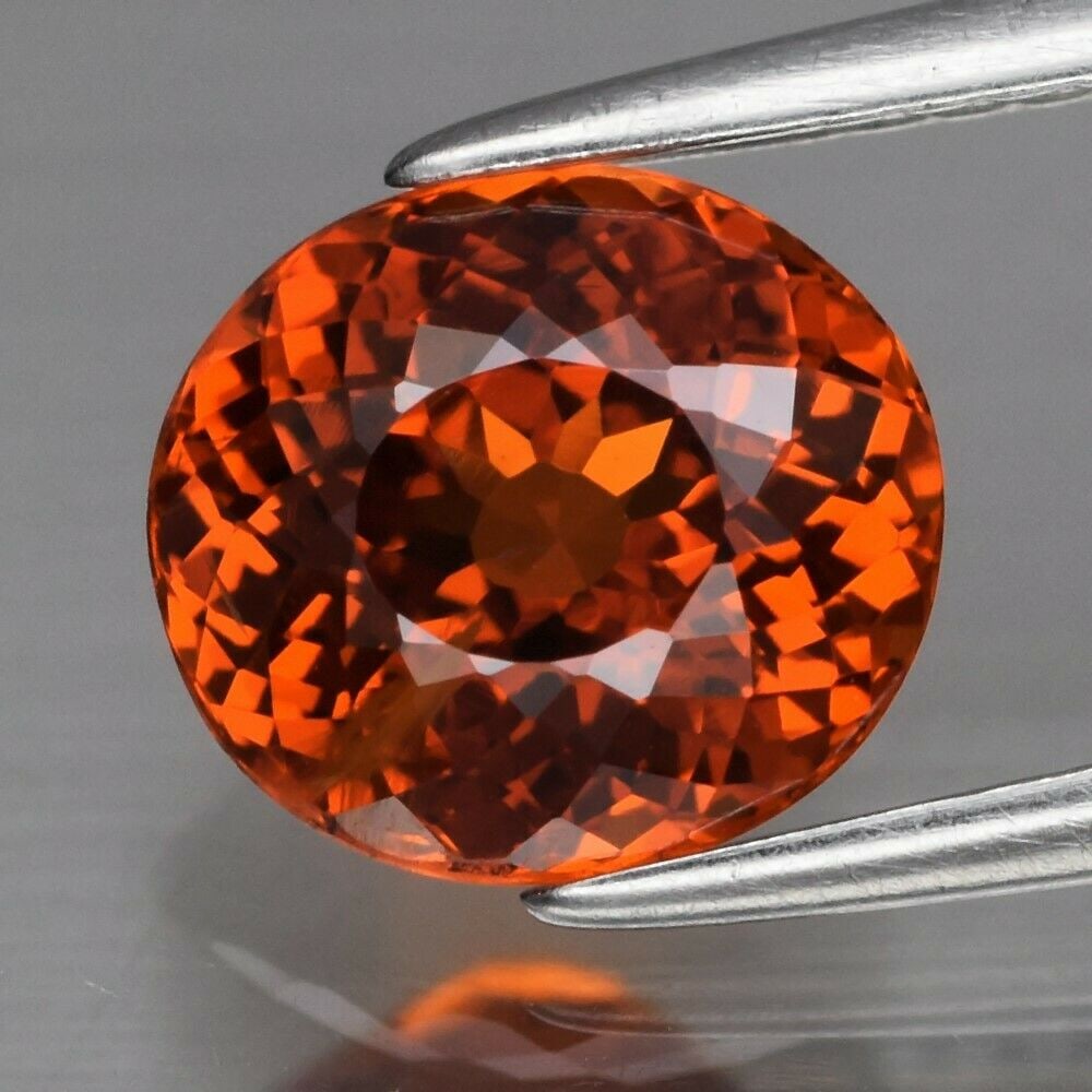 2.20 ct. Natural Orange Spessartite Garnet - NAMIBIA, AFRICA: 2.20 ct. Natural Orange Spessartite Garnet - NAMIBIA, AFRICA Shape - Oval Color - Orange Clarity - VS Ct. Weight - 2.20 ct. Dimensions - 7.80 x 7.00 x 4.50 mm Origin - NA