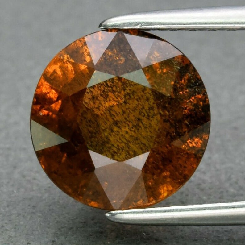 3.12 ct. Natural Unheated Greenish Yellow Sapphire - TANGA: 3.12 ct. Natural Unheated Greenish Yellow Sapphire - TANGA Shape - Round Color - Greenish Yellow Clarity - I1 Ct. Weight - 3.12 ct. Dimensions - 8.00 x 5.50 mm Origin - T