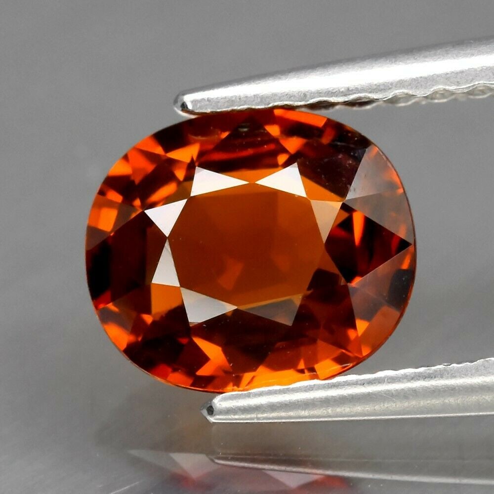 1.36 ct. Unheated Natural Spessartite Garnet - NAMIBIA: 1.36 ct. Unheated Natural Spessartite Garnet - NAMIBIA Cut - Cushion Color - Mandarin Orange Ct. Weight - 1.36 ct. Clarity - VVS Dimensions - 7.00 x 6.00 x 3.10 mm Origin
