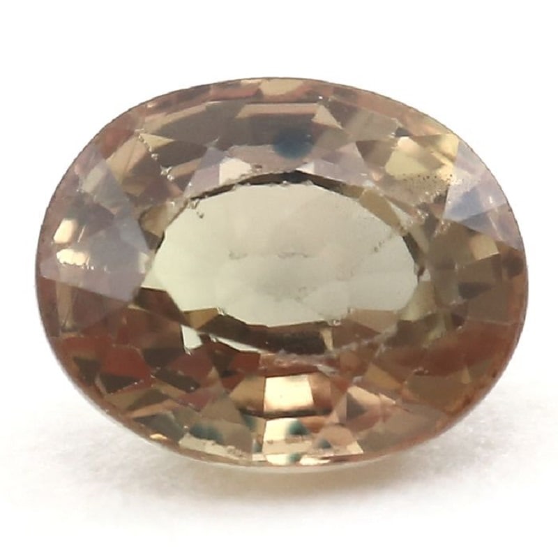 0.55 ct. Green Orange Sapphire - MADAGASCAR: 0.55 ct. Green Orange Sapphire - MADAGASCAR Color - Green Orange Clarity - VVS Cut - Oval Mixed cut Ct. wt. - 0.55 ct. Origin - MADAGASCAR Treatment - Na