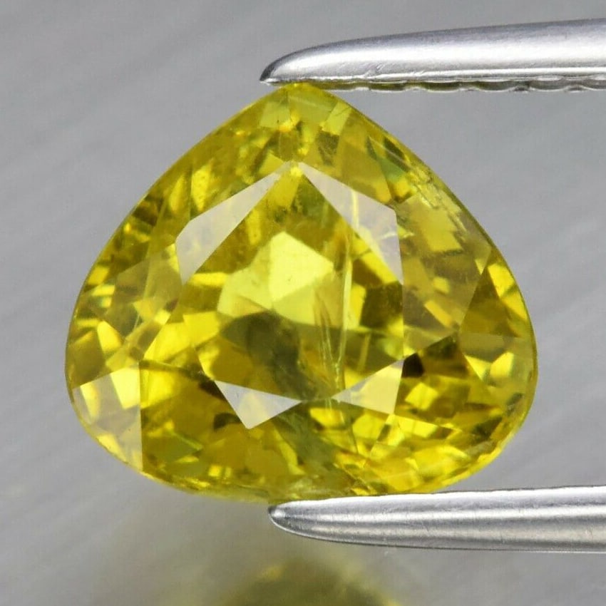 2.12 ct. Natural Greenish Yellow Mali Garnet - MADAGASCAR, AFRICA: 2.12 ct. Natural Greenish Yellow Mali Garnet - MADAGASCAR, AFRICA Shape - Pear Color - Greenish Yellow Clarity - SI1 Ct. Weight - 2.12 ct. Dimensions - 7.50 x 6.70 x 5.50 mm