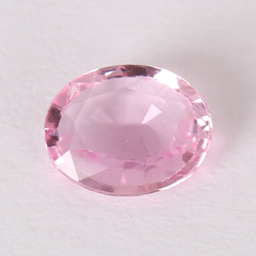 GFCO (SWISS) Certified 0.75 ct. Padparadscha Sapphire -SRI LANKA (CEYLON): GFCO (SWISS) Certified 0.75 ct. Padparadscha Sapphire -SRI LANKA (CEYLON) Cut - Oval Brilliant Step Cut Color - Orange-Pink / Pink-Orange Clarity - VS Ct. Weight - 0.75 ct. Dimensions - 6.81 x