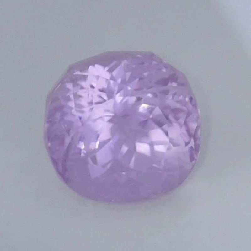 IGI Cert. 10.61 ct. Kunzite - Purplish Pink AFGHANISTAN: IGI Certified 10.61 ct. Kunzite - Purplish Pink - AFGHANISTAN Excellent Color and clarity Cut - Rectangular Cushion Mixed cutColor - Purplish PinkClarity - VSCt. Weight - 10.61 ct.<