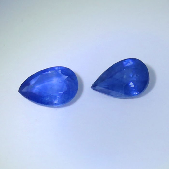 IGI Certified Set of 2 Blue Sapphires - Madagascar: IGI Certified Set of 2 Blue Sapphires - Madagascar Color - Blue Cut - Pear Mixed cut Clarity - VS-SI Ct. Weight - 0.45 + 0.47 = 0.92 ct. Dimensions - 6.10 x 4.22 x 2.06 mm and 6.09 x 3.88 x 2.