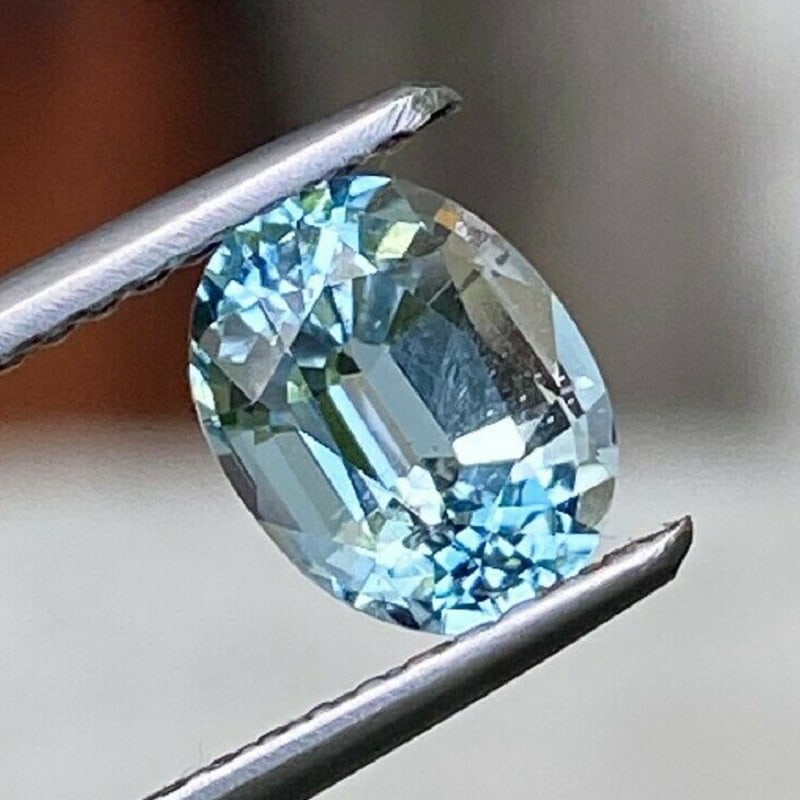 1.24 ct. Natural Blue Aquamarine - BRAZIL: 1.24 ct. Natural Blue Aquamarine - BRAZIL Color - Blue Clarity - VS Cut - Oval Ct. Weight - 1.24 ct. Dimensions - 7.60 X 5.90 mm Origin - BRAZIL T