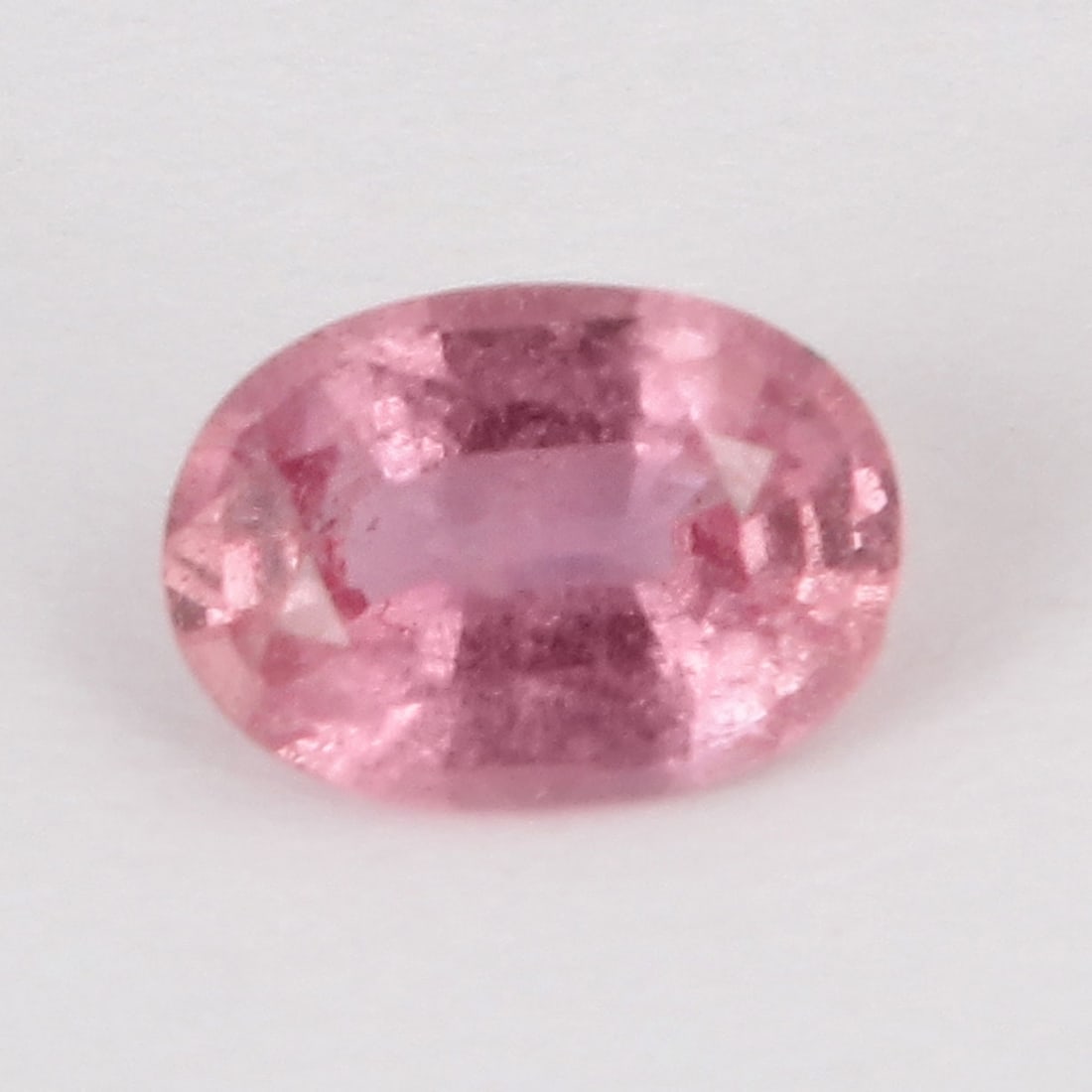 GFCO (SWISS) Certified 1.27 ct. Padparadscha Sapphire - MADAGASCAR: GFCO (SWISS) Certified 1.27 ct. Padparadscha Sapphire - MADAGASCAR Cut - Oval Brilliant Step Cut Color - Orangy - Pink Clarity - SI Ct. Weight - 1.27 ct. Dimensions - 7.81 x 5.59 x 3.41 mm </