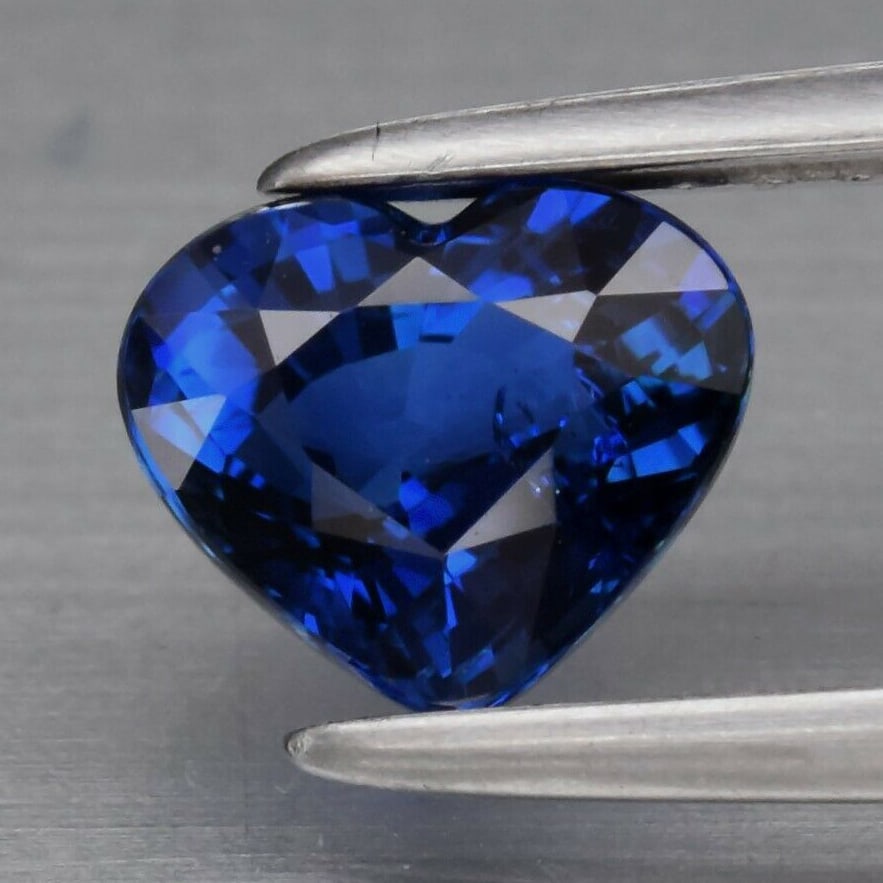 1.01 ct. Natural Royal Blue Sapphire - MADAGASCAR: 1.01 ct. Natural Royal Blue Sapphire - MADAGASCAR Shape - Heart Color - Royal Blue Clarity - SI1 Ct. Weight - 1.01 ct. Dimensions - 6.15 x 5.35 x 3.75 mm Origin - MADAGAS