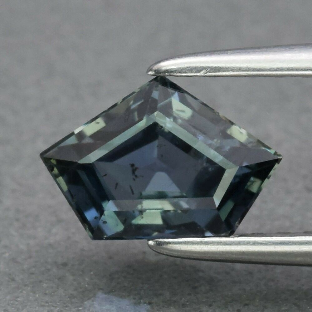 1.13 ct. Natural Untreated Greenish Blue Sapphire - TANZANIA: 1.13 ct. Natural Untreated Greenish Blue Sapphire - TANZANIA Shape - Pentagon Color - Greenish Blue Clarity - VS Ct. Weight - 1.13 ct. Dimensions - 7.50 x 5.00 x 3.80 mm Origin <