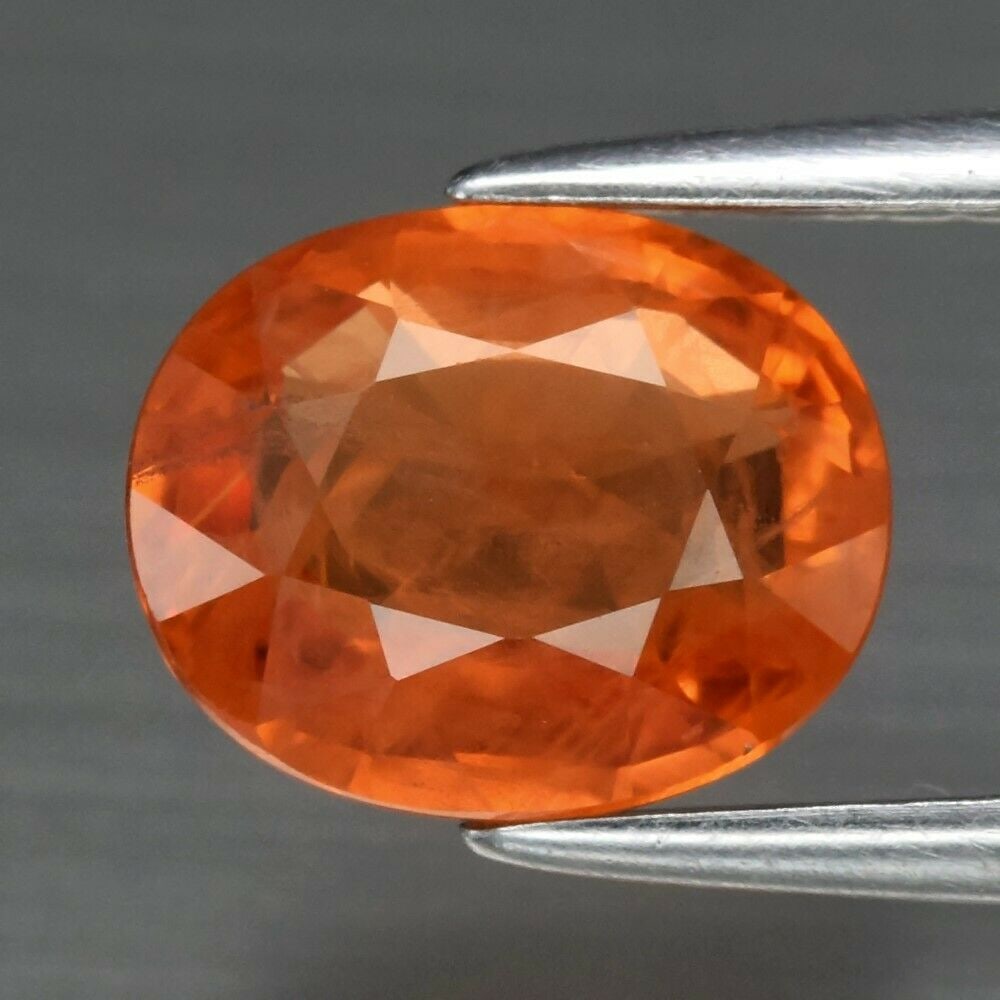 2.00 ct. Natural Orange Sapphire - MADAGASCAR: 2.00 ct. Natural Orange Sapphire - MADAGASCAR Shape - Oval Color - Orange Clarity - SI1 Ct. Weight - 2.00 ct. Dimensions - 8.00 x 6.50 x 3.70 mm Origin - MADAGASCAR, AFRI