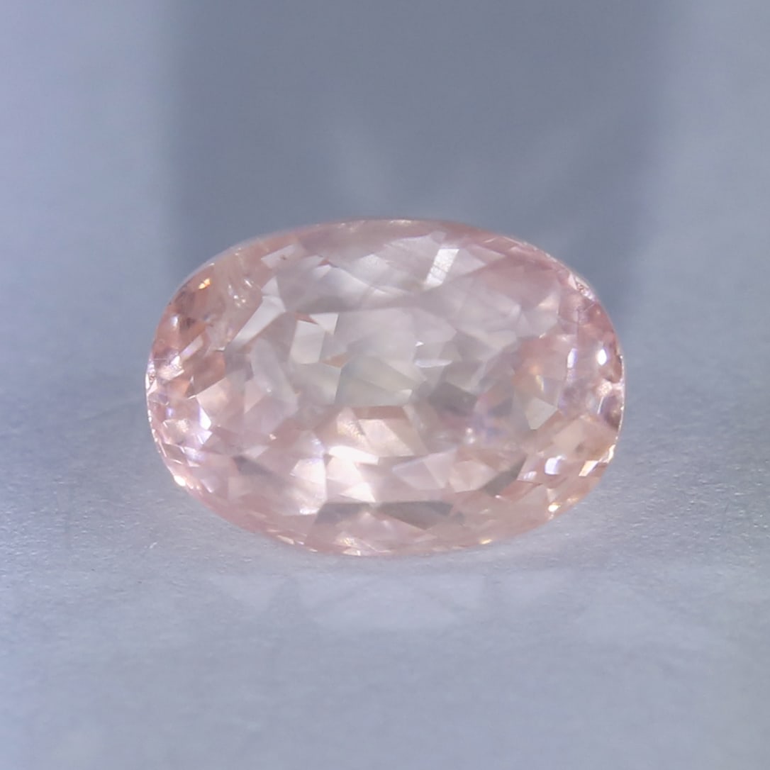 IGI Certified 3.58 ct. Padparadscha Sapphire - SRI LANKA, CEYLON: IGI Certified 3.58 ct. Padparadscha Sapphire - SRI LANKA, CEYLON Color - Pinkish Orange Clarity - Transparent Cut - Rectangular Cushion Mixed Cut Ct. wt. - 3.58 ct. Clarity - VS Dimensio