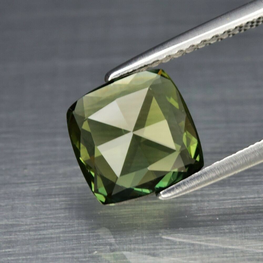 1.74 ct. Natural Green Sapphire - THAILAND: 1.74 ct. Natural Green Sapphire - THAILAND Shape - Fancy Antique Rose cut Color - Green Clarity - VS Ct. Weight - 1.74 ct. Dimensions - 8.00 x 8.00 x 2.40 mm Origin - THA