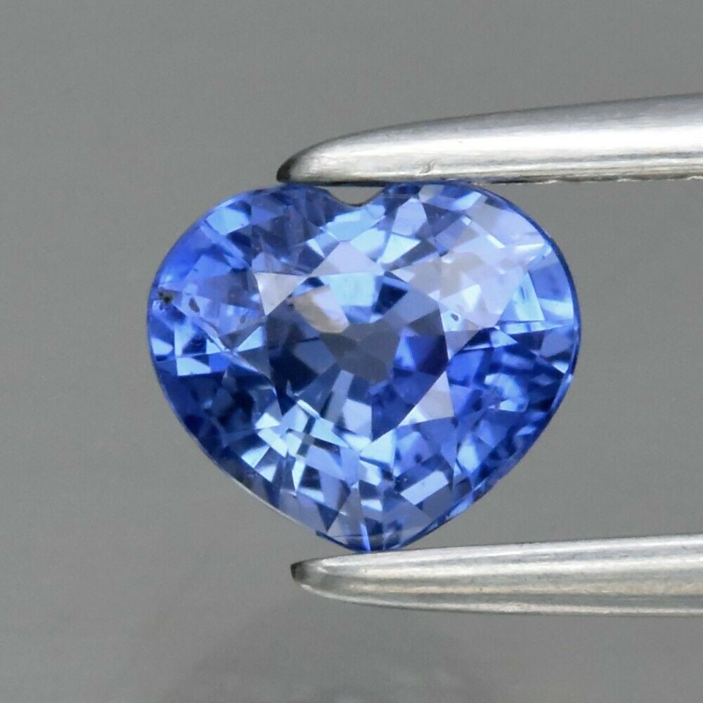 0.57 ct. Natural Blue Sapphire - SRI LANKA, CEYLON: 0.57 ct. Natural Blue Sapphire - SRI LANKA, CEYLON Shape - Heart Color - Blue Clarity - VS Ct. Weight - 0.57 ct. Dimensions - 5.00 x 4.50 x 3.10 mm Origin - SRI LANKA, CE