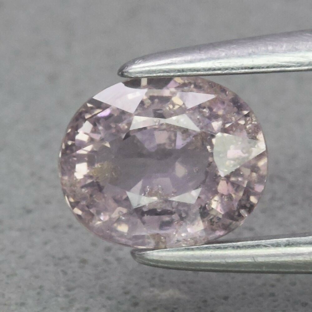 0.71 ct. Natural Unheated Purple Sapphire - TANGA: 0.71 ct. Natural Unheated Purple Sapphire - TANGA Shape - Oval Color - Purple Clarity - SI1 Ct. Weight - 0.71 ct. Dimensions - 5.40 x 4.60 x 3.20 mm Origin - TANGA
