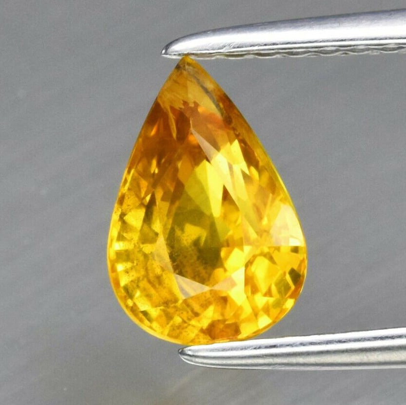 1.45 ct. Natural Yellow Sapphire - SRI LANKA, CEYLON: 1.45 ct. Natural Yellow Sapphire - SRI LANKA, CEYLON Color - Yellow Cut - Pear Ct. Wt. - 1.45 ct. Clarity - VS Dimensions - 8.00 x 5.50 x 4.30 mm Origin - SRI LANKA, CEYL
