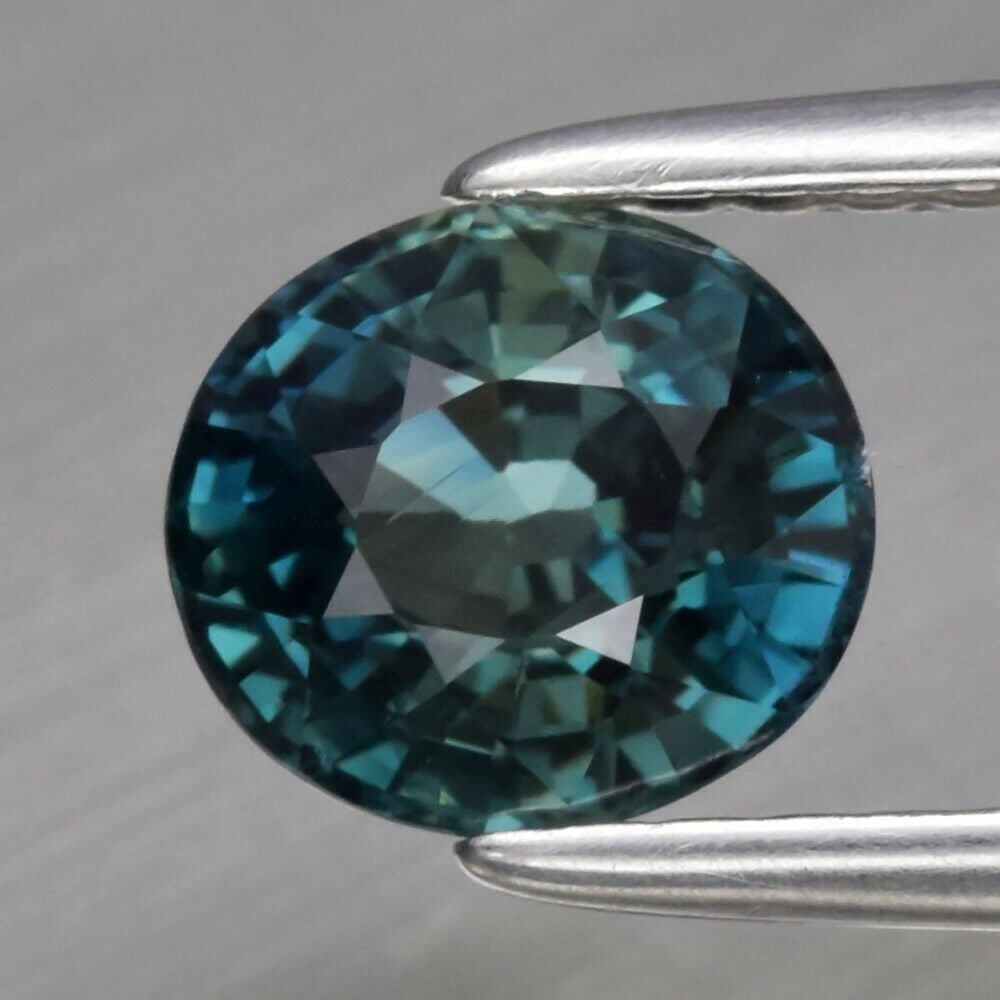 1.12 ct. Natural Greenish Blue Sapphire - AUSTRALIA: 1.12 ct. Natural Greenish Blue Sapphire - AUSTRALIA Color - Greenish Blue Cut - Oval Ct. Wt. - 1.12 ct. Clarity - SI1 Dimensions - 6.07 x 5.47 x 3.94 mm Origin - AUSTRALI