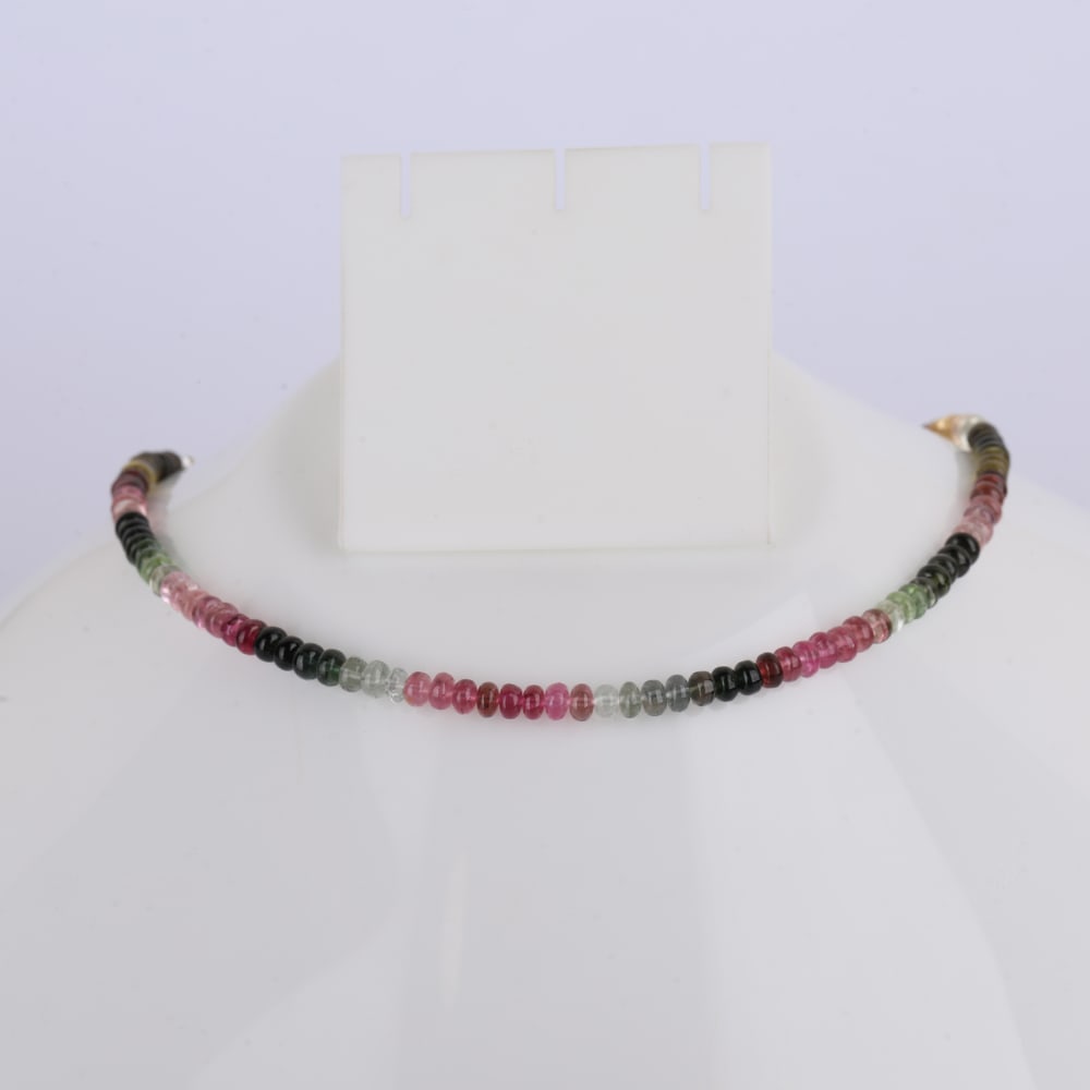 48.42 ct. Natural Tourmaline Beads Single Strand Necklace: 48.42 ct. Natural Tourmaline Beads Single Strand Necklace Color - Mix Shape - Rondelle beads Gem Weight - 48.42 ct. (with sterling silver) With sterling silver lock &