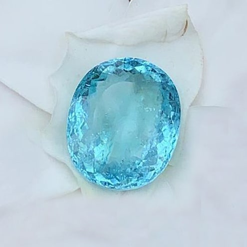 GIA 16.33 ct. RARE "NEON BLUE" Paraiba Tourmaline: GIA Certified 16.33 ct. RARE " NEON BLUE " Paraiba Tourmaline - BRAZIL Ct. Weight - 16.33 ct. Color - Blue Cut - Oval Modified Brilliant cut Clarity - SI Dimensions - 18.02 x 14.89 x 8.04 mm</
