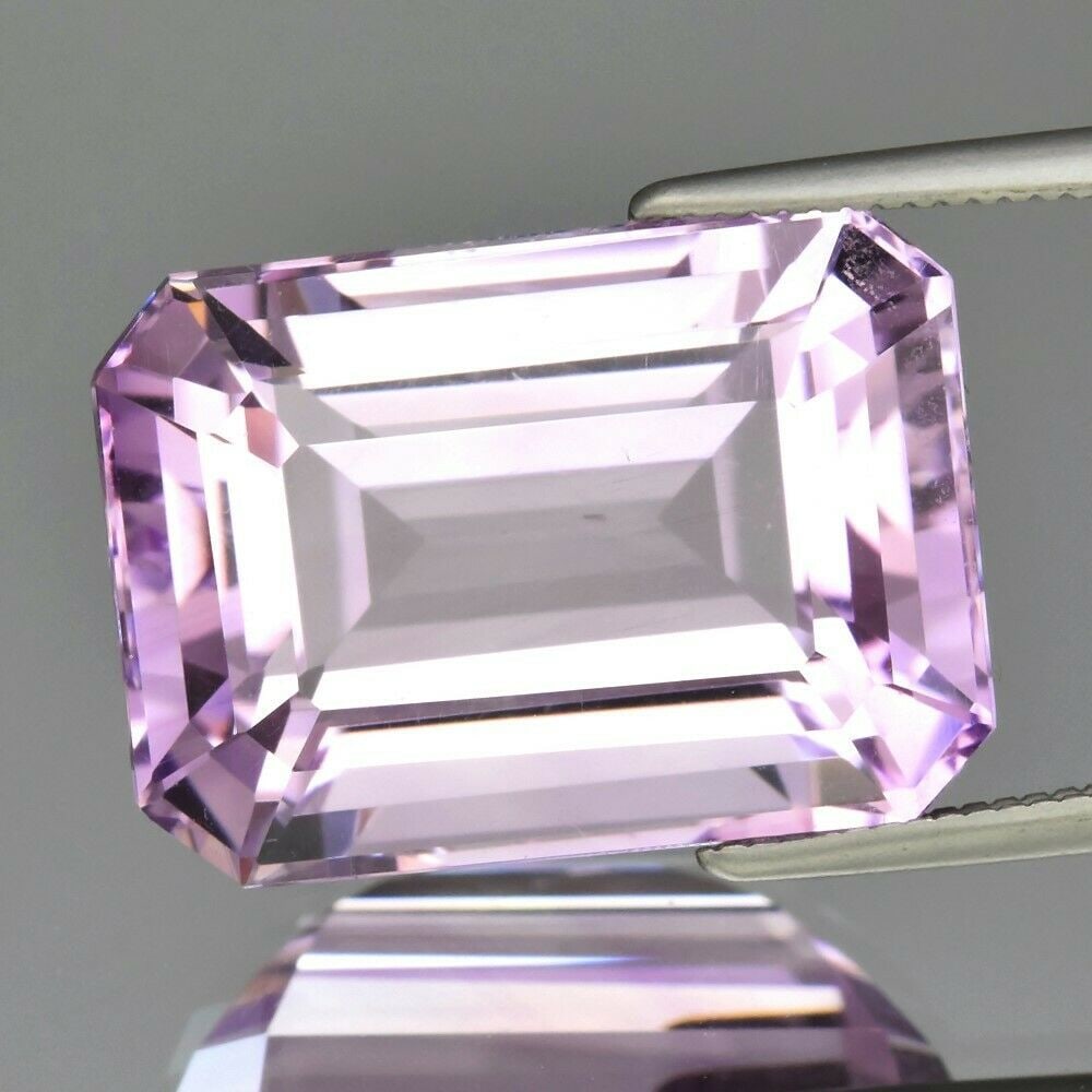 13.66 ct. Natural Purple Amethyst - BRAZIL: 13.66 ct. Natural Light Purple Amethyst - BRAZIL Ct. Weight - 13.66 ct. Color - Light Purple Clarity - VVS Cut - Octagon Dimensions - 16.80 x 12.20 x 9.20 mm Origin - BRA